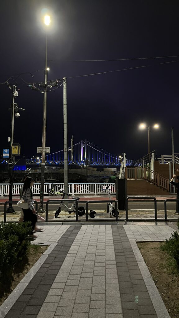 Illuminated Gwangandaegyo Bridge view from the street right outside Millac The Market at Night