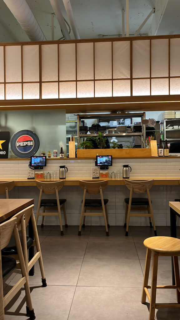Clean interior bar seating at Busendong Gwangan station restaurant