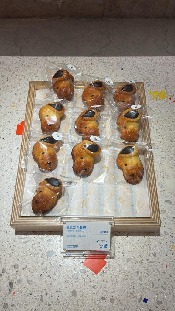 Adorable Snoopy-shaped coconut madeleines at Haeundae Snoopy Place Busan