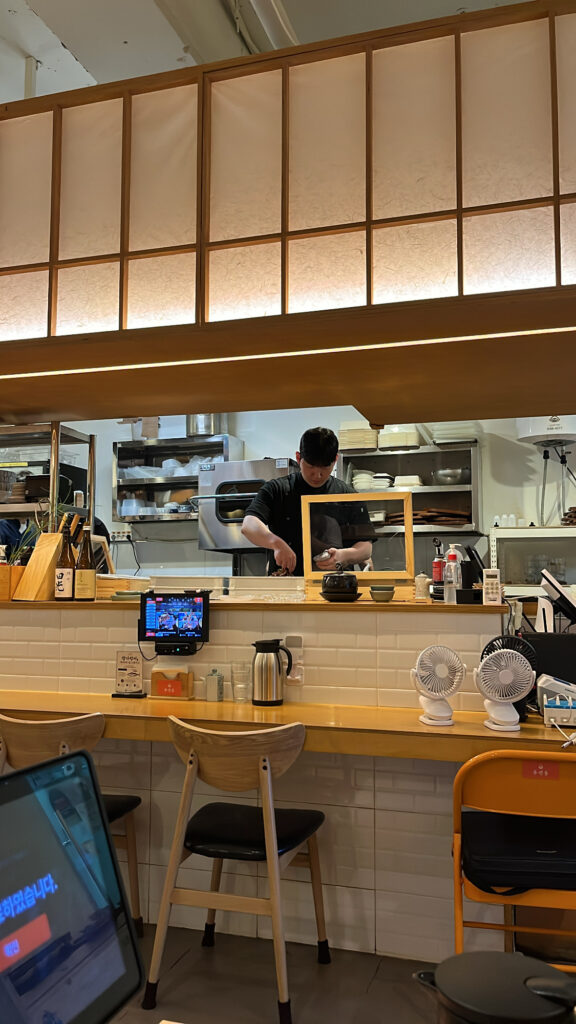 Open kitchen where chefs prepare best seafood in Gwangalli