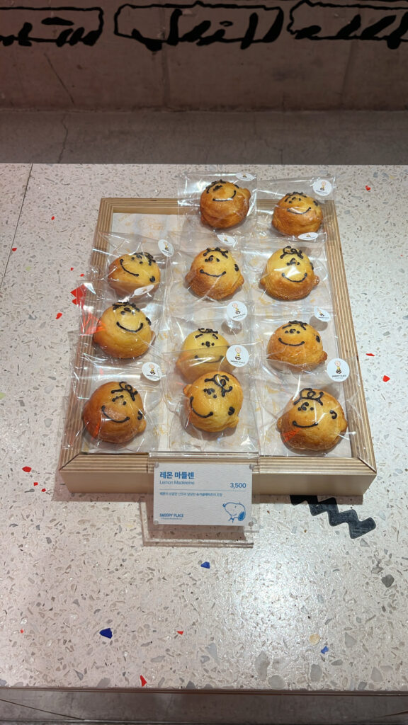 Cute Charlie Brown face-shaped lemon madeleines at Busan dessert cafe