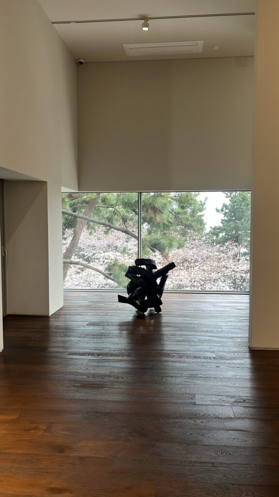 Lee Bae charcoal sculpture in high ceiling exhibition hall at Johyun Gallery Busan