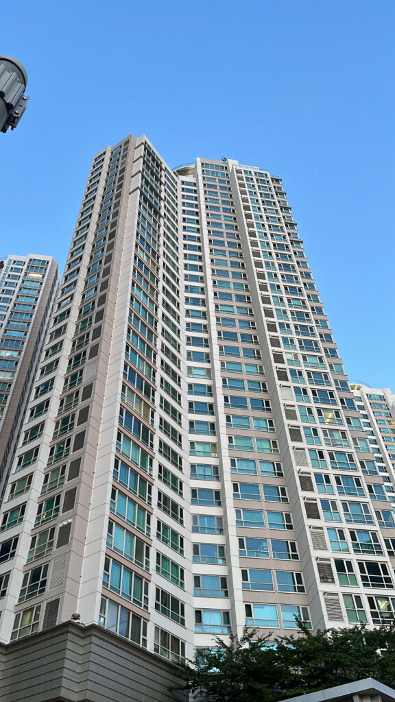 The tall building located right outside Centum City Station Exit 4 near the Busan wine shop