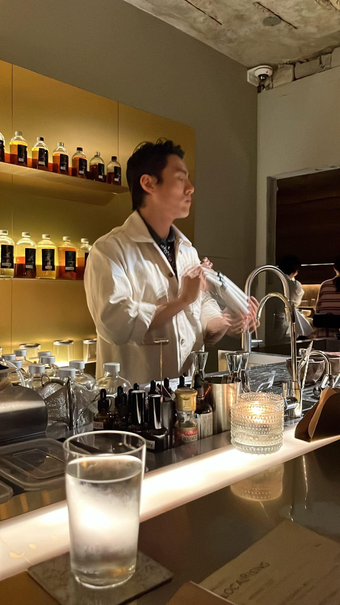 Bartender shaking signature drink at Busan cocktail bar Corduroy Fellaz