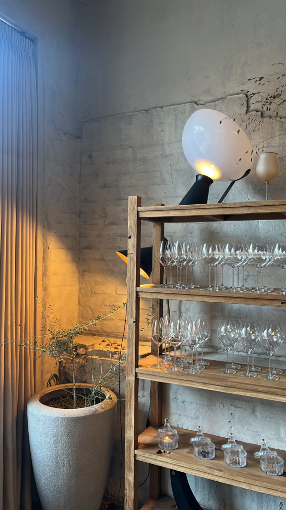 Private dining room table setting with a stained glass pendant light at Moment Local Busan