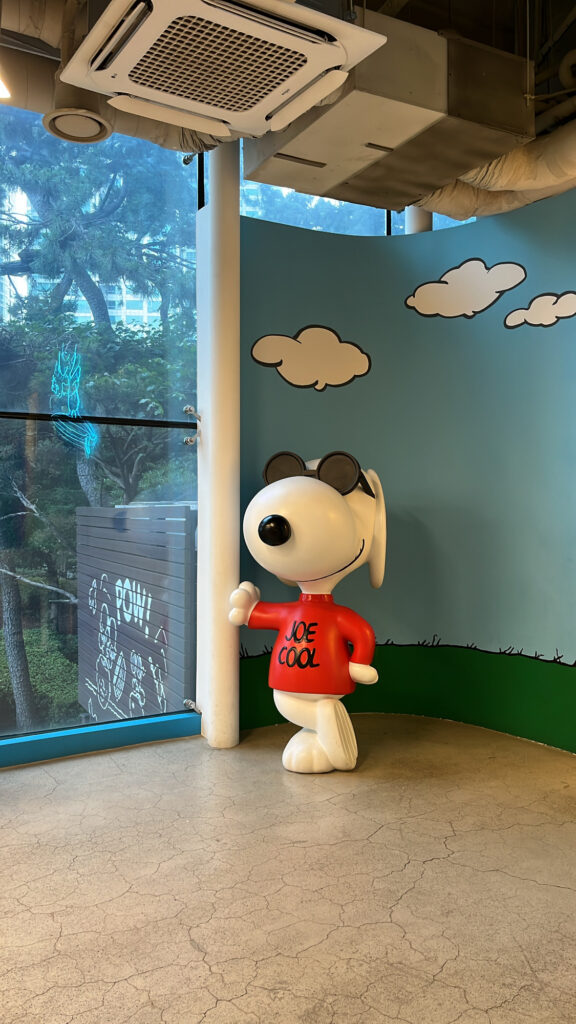Life-size Joe Cool Snoopy statue photo spot inside Snoopy Place Busan