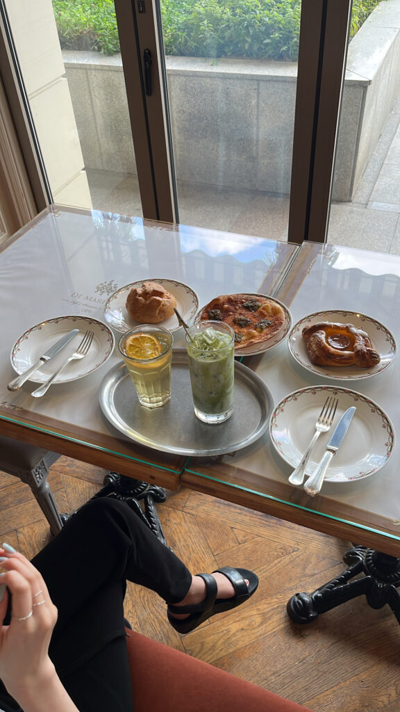 De Marigny Busan table with drinks and OPS pastries