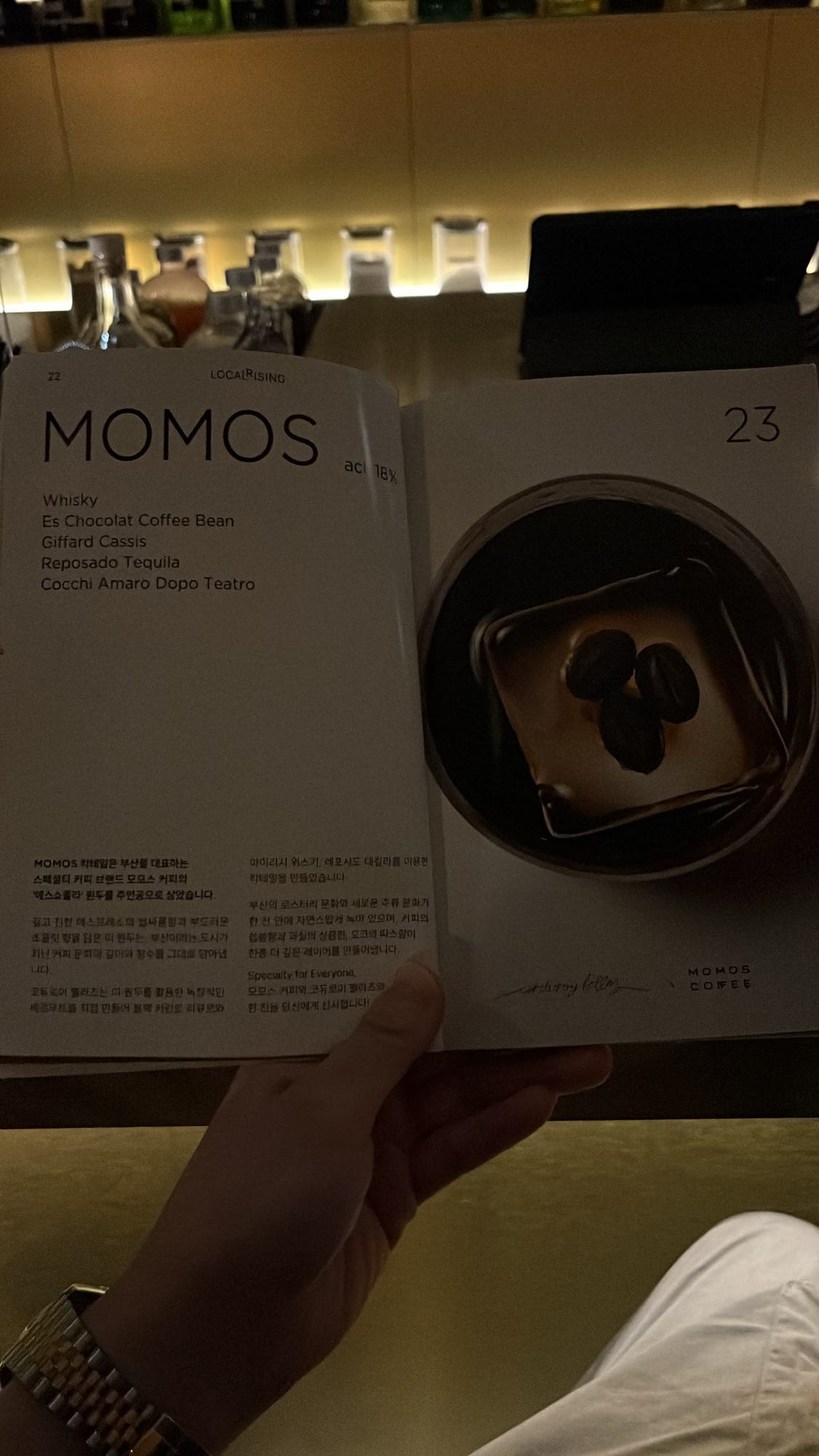 Menu page describing Momos coffee collaboration cocktail
