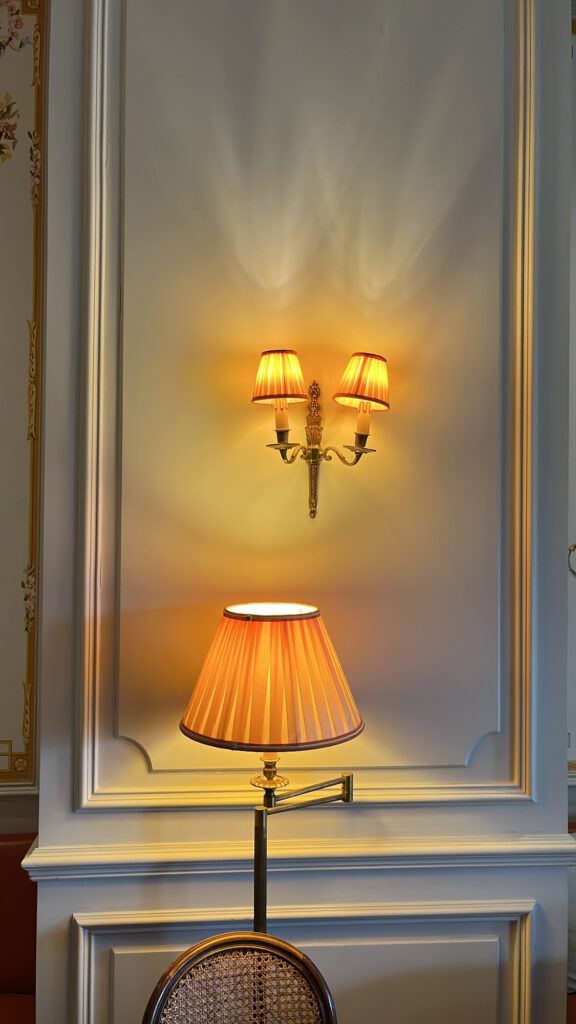 De Marigny Busan warm wall sconce lamp creating cozy ambiance