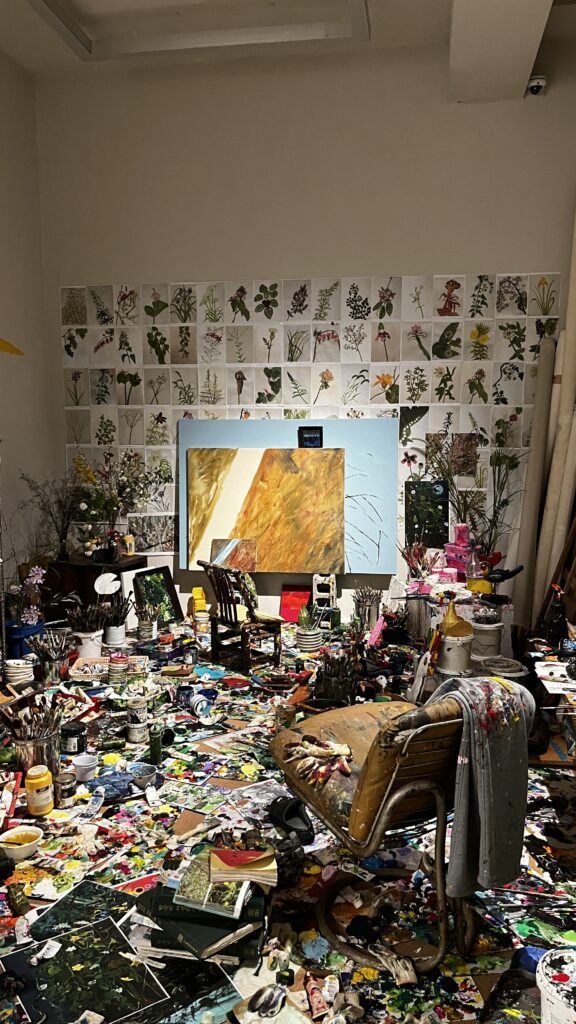 Recreated artist studio of Kim Jong-hak with paint supplies and sketches at Johyun Gallery Busan