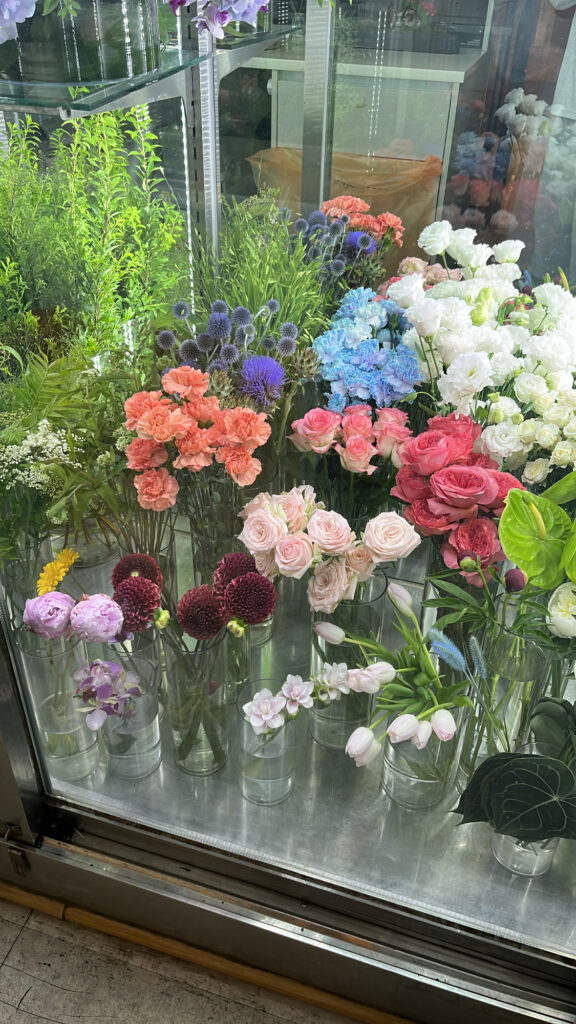 Fresh colorful flowers displayed inside the hotel flower shop