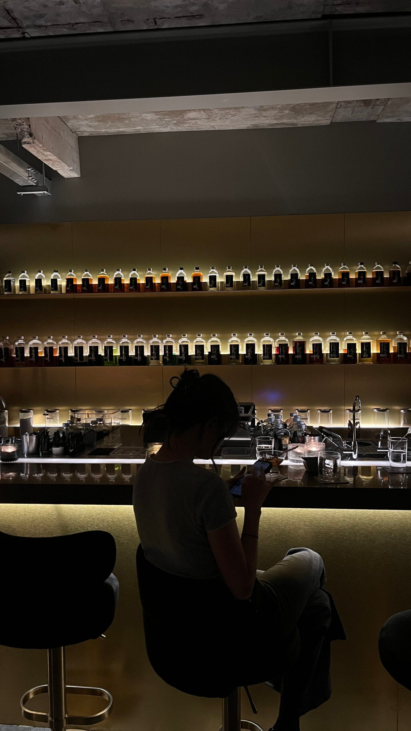 Guest enjoying the moody ambience at Corduroy Fellaz counter