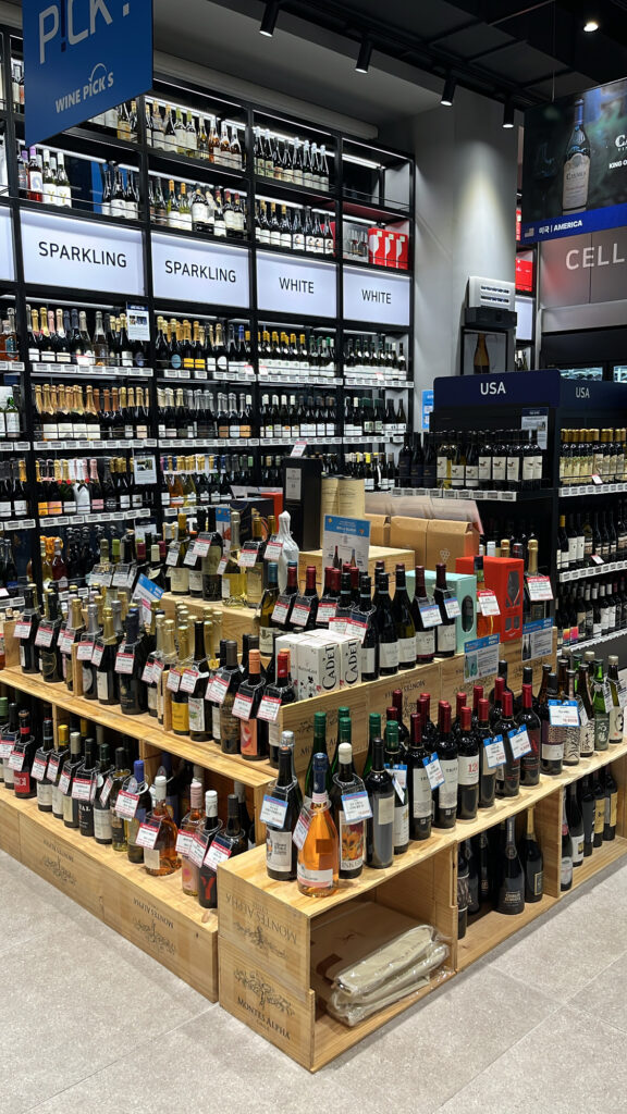 Wide selection of wine bottles displayed inside WINE PICKS
