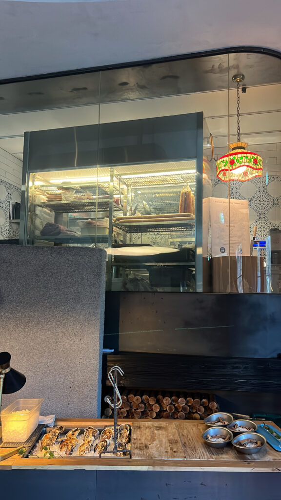 Fresh triploid oyster display on ice at Moment Local Busan oyster dining bar