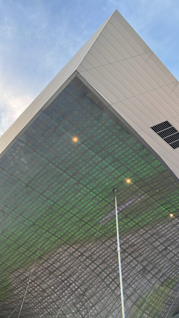 Exterior view of the iconic Double Cone glass facade at Busan Cinema Center