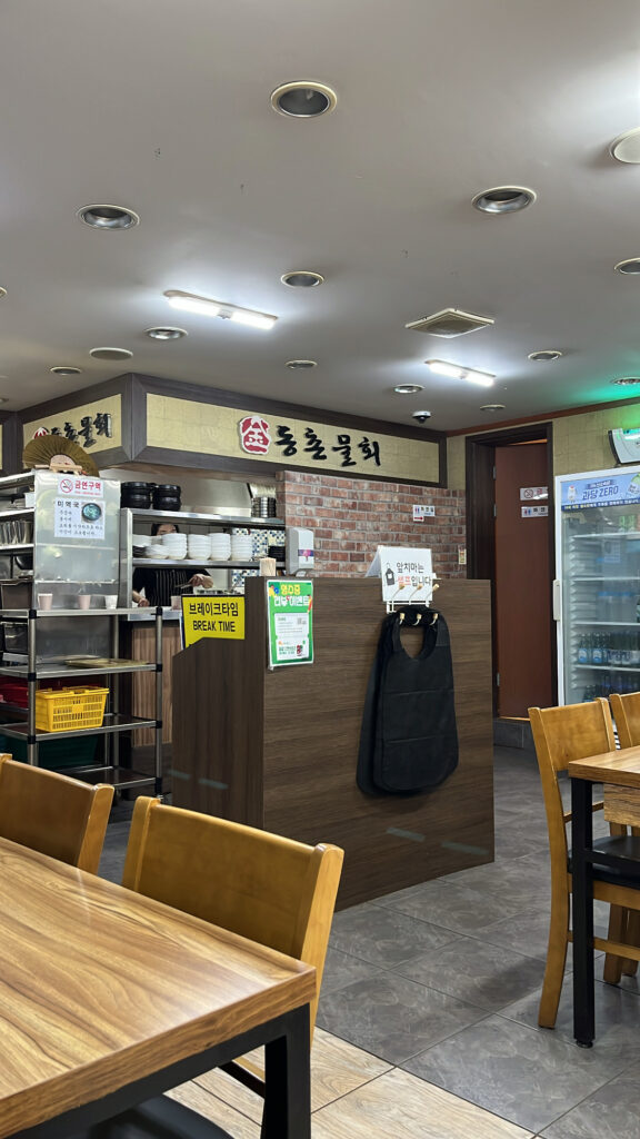 Spacious indoor seating area inside Dongchon Mulhoe Busan restaurant