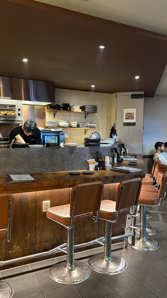 Open kitchen counter seating at Kuchiga Busan izakaya