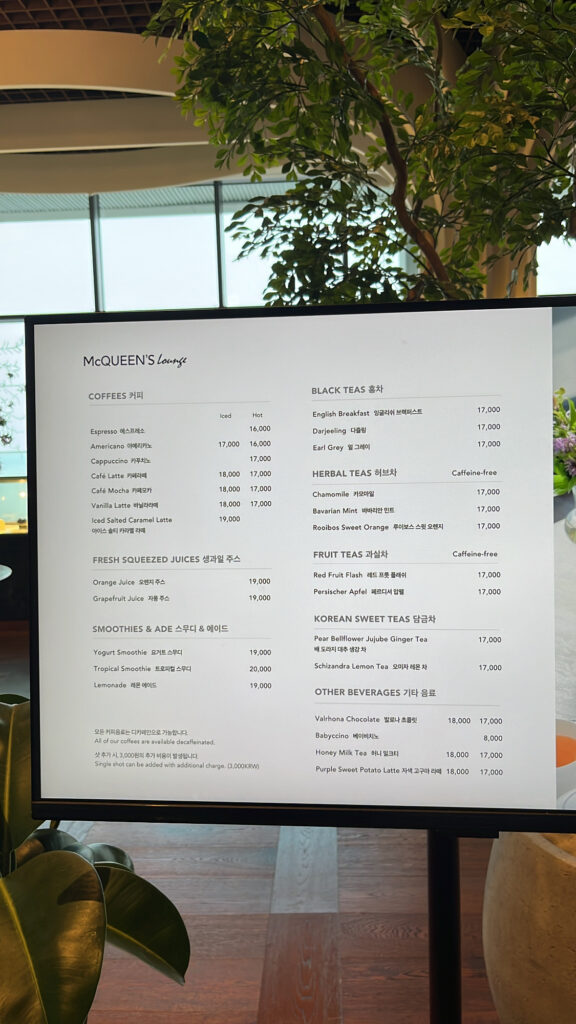 Overview of drinks and dessert menu board at McQueen's Lounge Busan