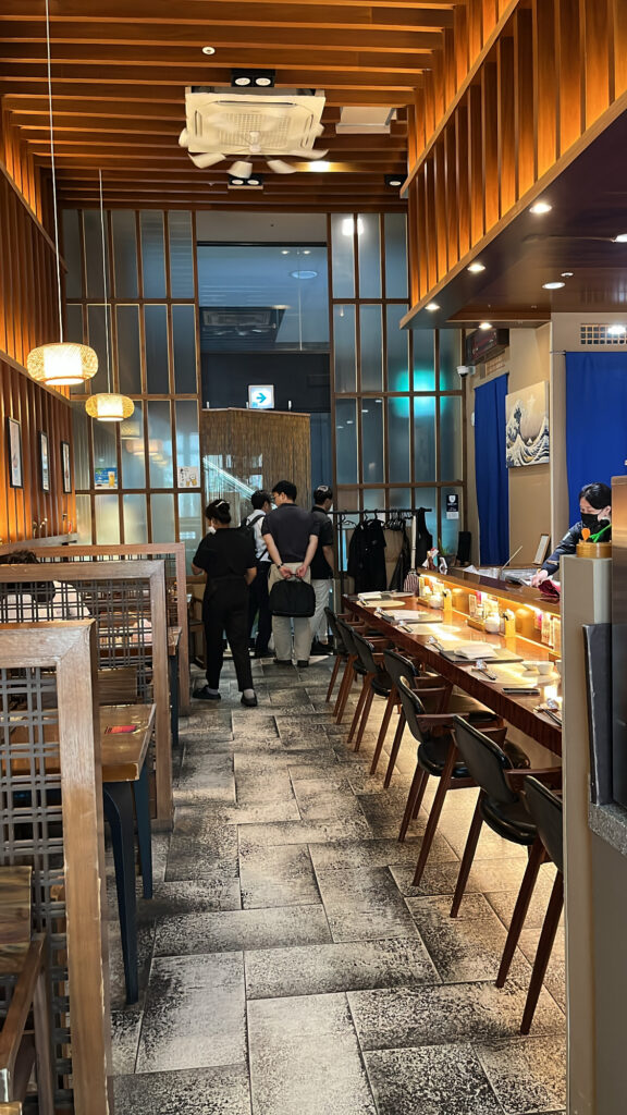 Interior view of Giyohang Haeundae showing counter bar and table seating