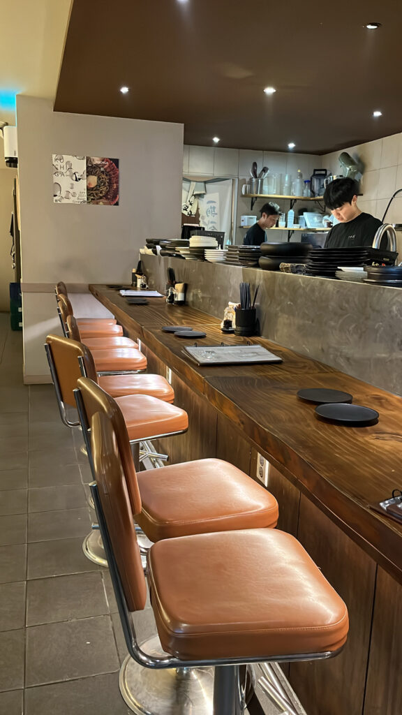 Cozy bar table seating inside Kuchiga Busan Gwangalli