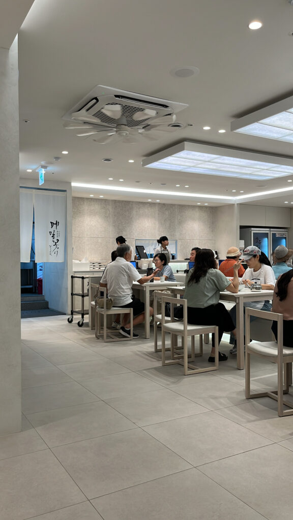 Clean and modern dining room interior at Moemiljip Busan