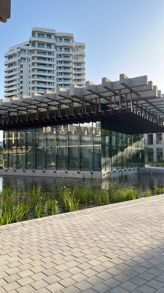 Modern standalone architecture housing Sobae restaurant with sleek glass exterior
