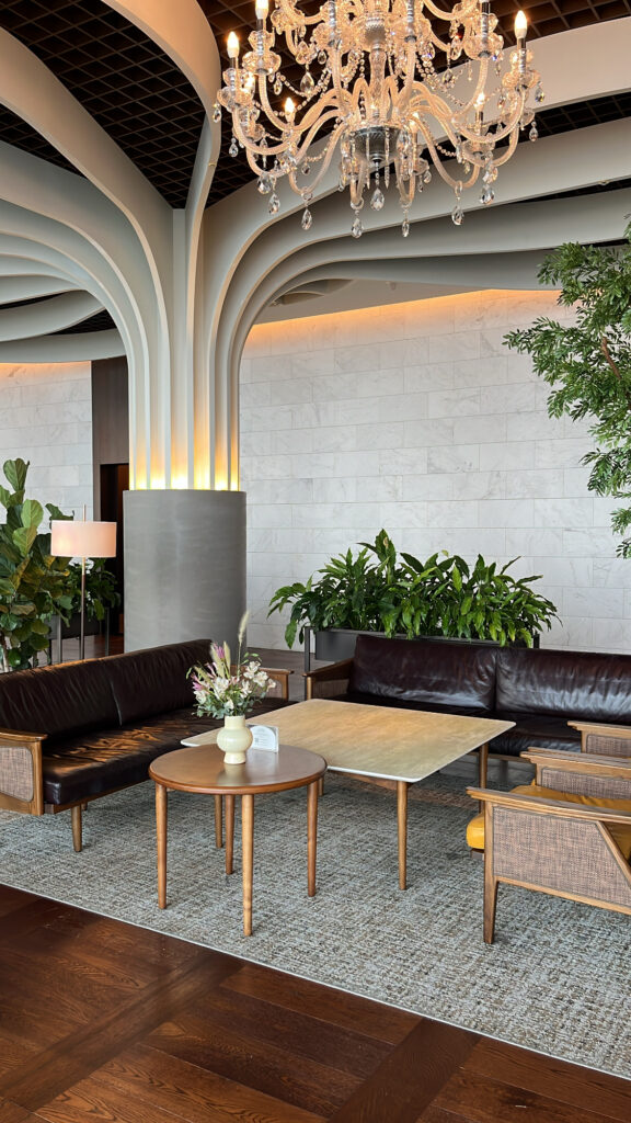 Cozy sofa seating area surrounded by modern interior at McQueen's Lounge Busan