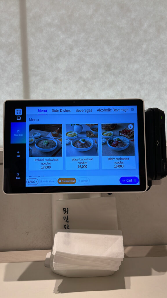 Kiosk screen showing main buckwheat noodle options at Moemiljip Busan