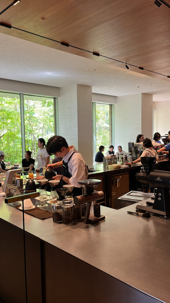 Bustling main hall and open coffee bar area at Momos Coffee Marine City