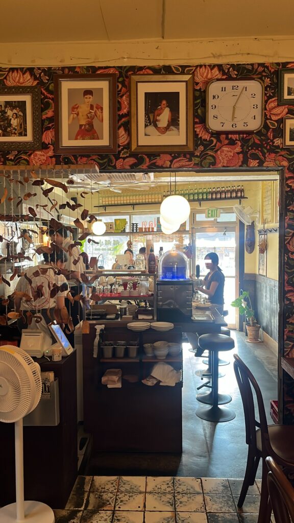 Bright dining hall atmosphere with casual seating at Pili Pili Busan
