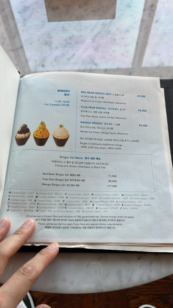 Seasonal shaved ice bingsu options in McQueen's Lounge Busan menu book