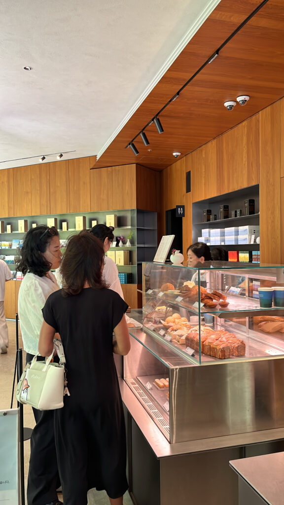 Order pick-up counter and smooth ordering line at Momos Coffee Marine City
