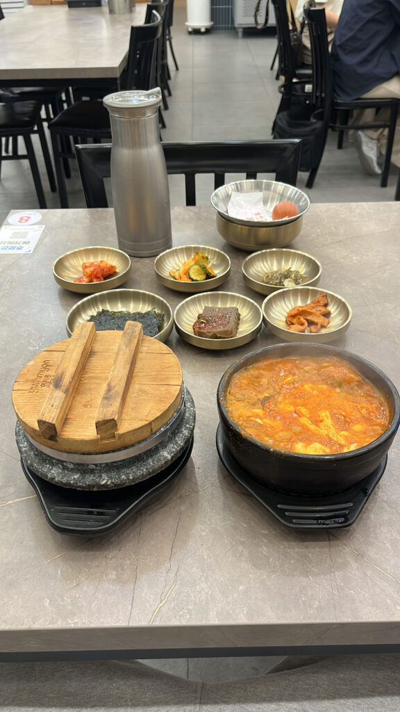 Beef soft tofu stew set with stone pot rice at Wandduk Sundubu Centum City