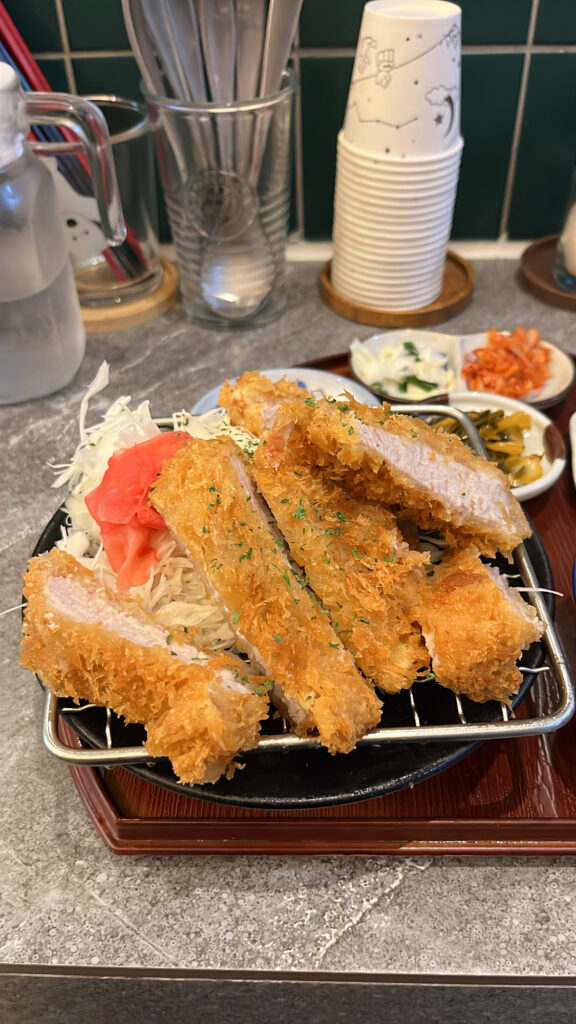 Close-up of thick, juicy Japanese tonkatsu at Katsu Mansion 10 Busan