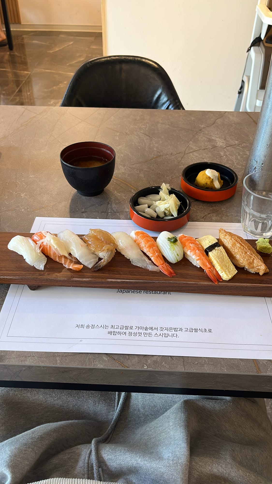 Fresh assorted Sushi Set A served on a wooden platter at Songjeong Sushi Busan