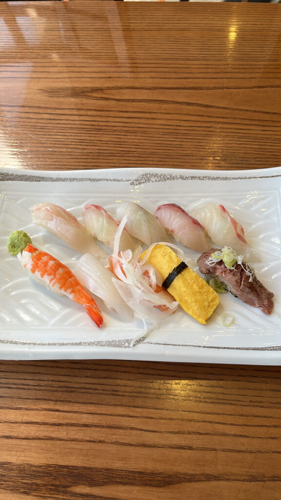 Close-up of 10-piece artisan sushi served at Moon Sushi