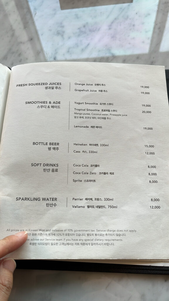 Fresh squeezed juices, fruit ades, and beer selections at McQueen's Lounge Busan