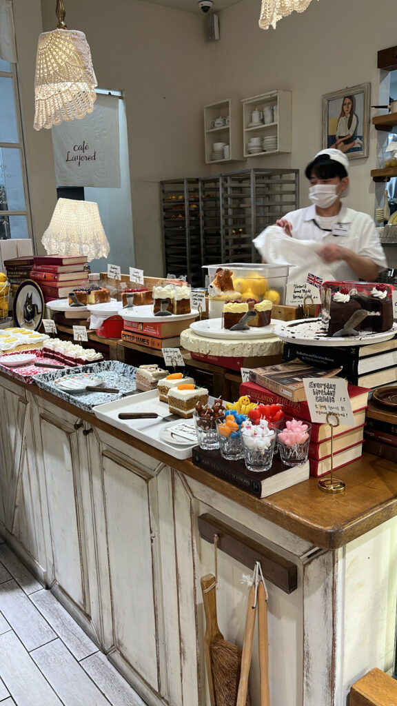 Wide variety of colorful sliced dessert cakes at Cafe Layered
