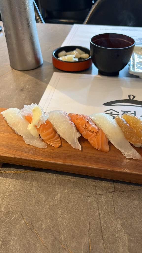 Freshly made nigiri sushi platter prepared with great skill by a former hotel chef at Songjeong Sushi Busan