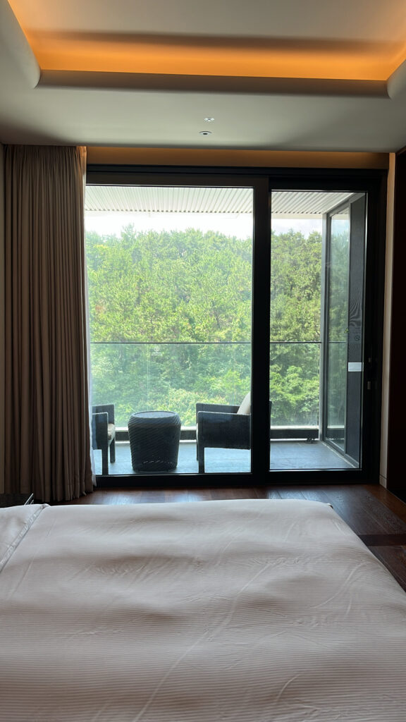Private balcony seating perfect for wine or tea with scenic forest views
