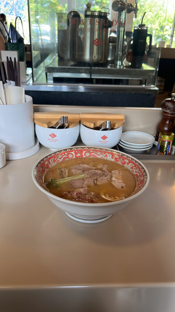 Signature Matsudo Miso Ramen served in a deep ceramic bowl at Matsudo Busan