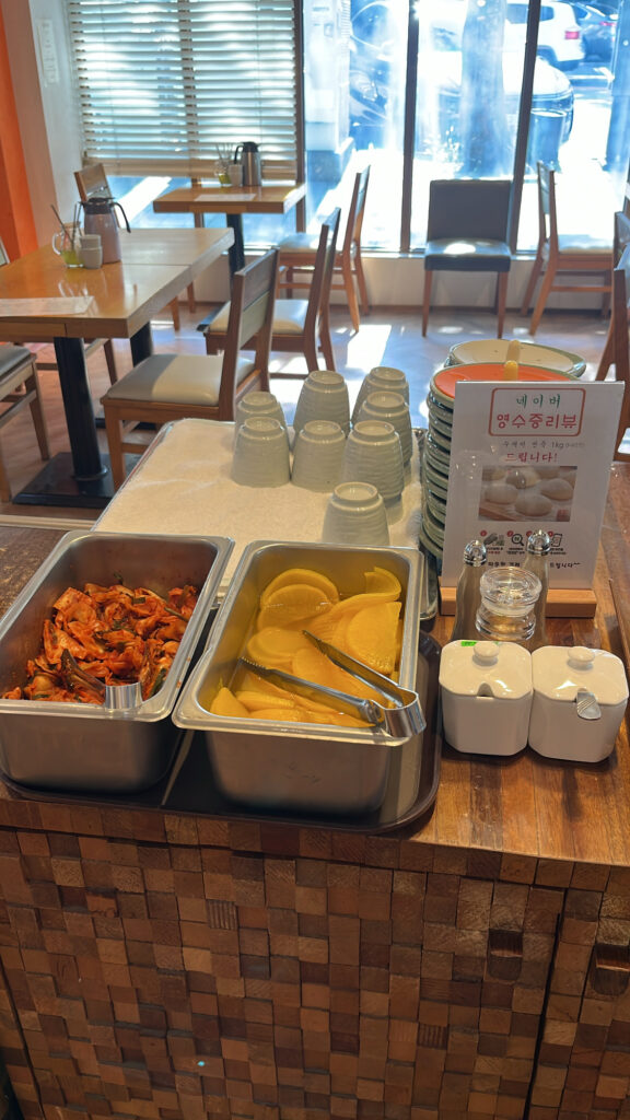 Self-service bar for additional side dishes at Songjeongjib Busan