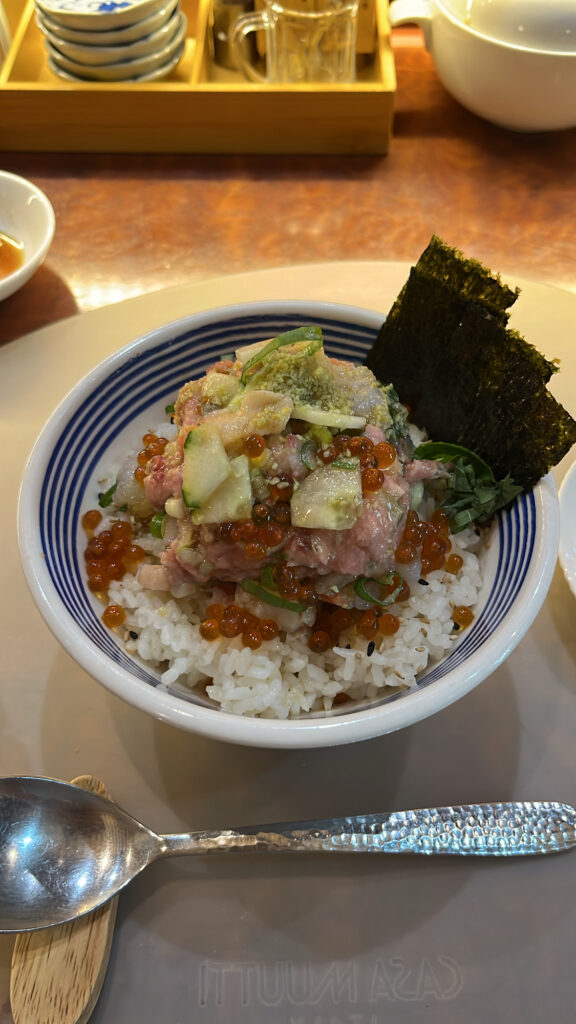 Detailed close-up view of fresh seafood volcano topping on Giyohang rice bowl