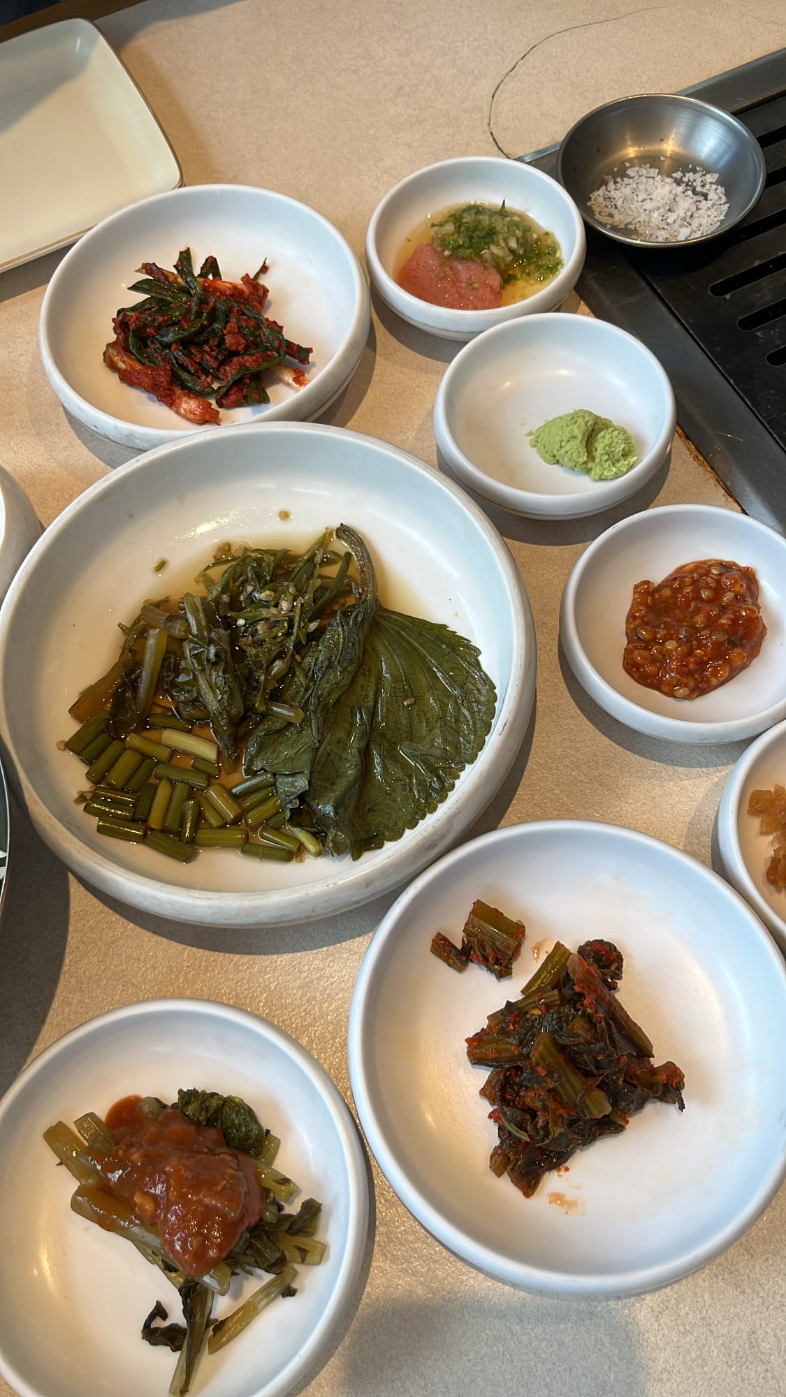 Colorful spread of traditional Korean side dishes and dipping condiments at Gohasoon