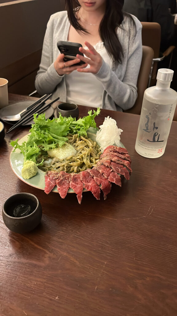 Basil sofa beef tataki dish served at Kuchiga Gwangalli sashimi bar