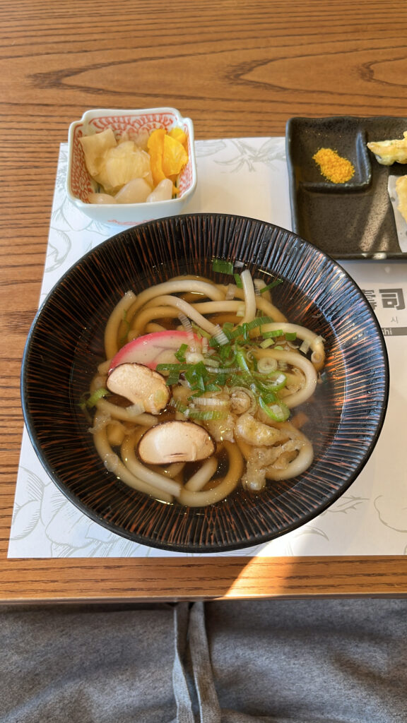 Hot udon noodle bowl included in the lunch sushi course
