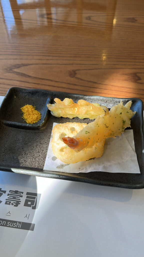 Crispy tempura served with curry salt at Moon Sushi