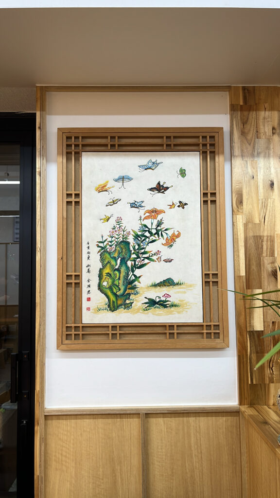 Frame artwork decoration inside Jeju Eunhuine Haejangguk near Gwanganri and Centum City