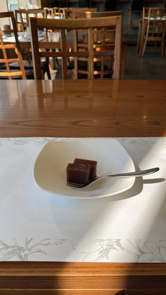 Traditional sweet red bean jelly dessert served after the meal