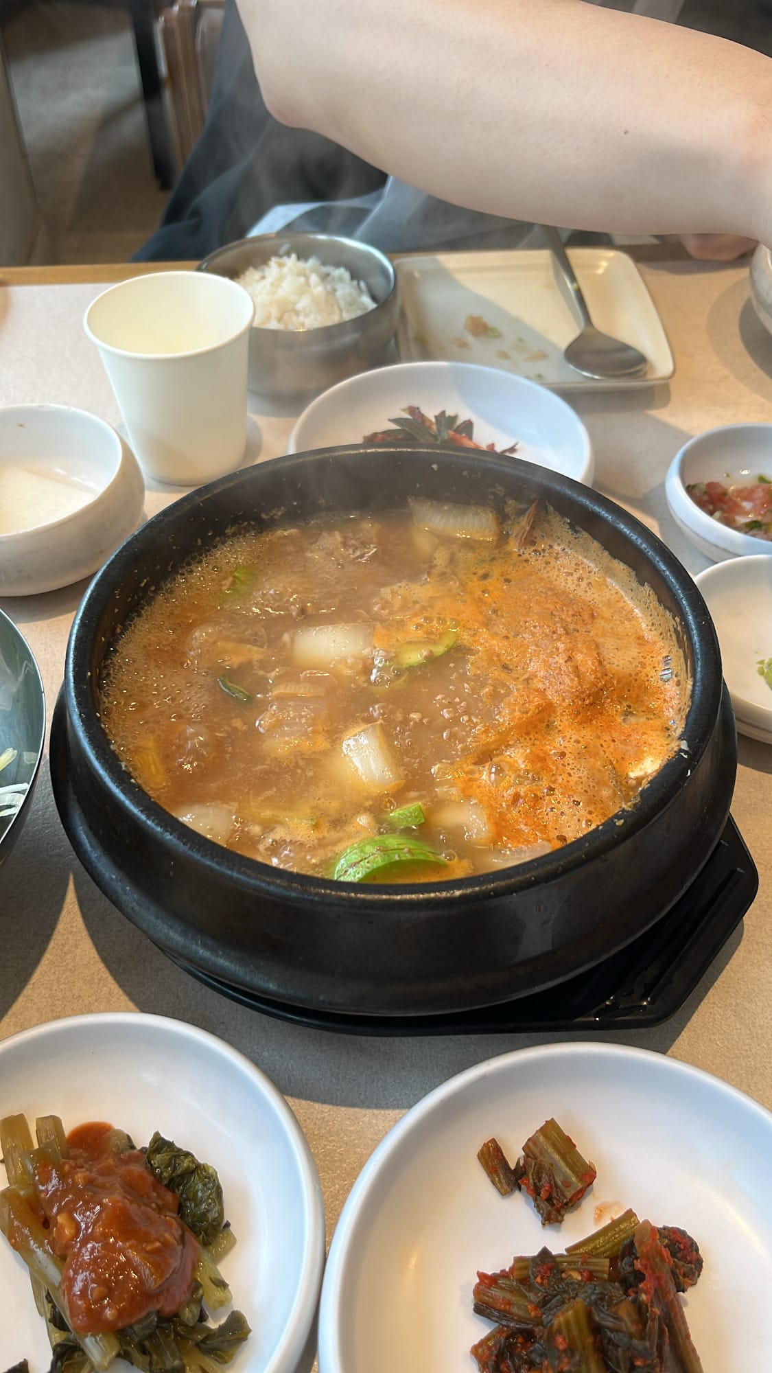 Boiling Korean soybean paste stew (doenjang-jjigae) served in a hot stone pot at Gohasoon